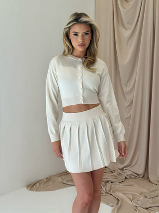 MABEL Knitted Long Sleeved Button Up Cardigan & Pleated Skirt Co-Ord In Vanilla