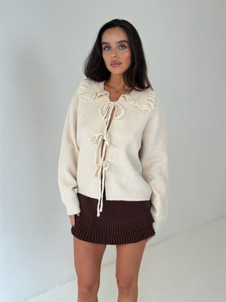 AUBREY Long Sleeved Tie Up Frill Collared Cardigan In Vanilla