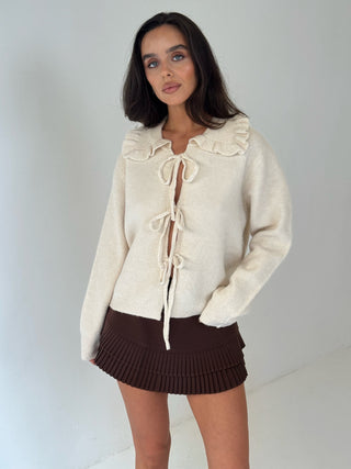 AUBREY Long Sleeved Tie Up Frill Collared Cardigan In Vanilla