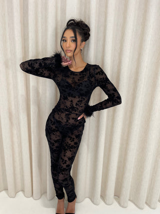 LORNA Long Sleeve Velvet Flock Mesh Jumpsuit With Feather Cuffs In Black